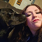 Sasskia Lee joined the competition — help win amazing prizes! woman, dog, face, selfie, makeup, couch, indoor, sign, sarcastic, black_dog, affection, closeup, portrait, furniture, curtain, earring, hair, light_switch, smile, cozy