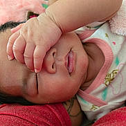 Jayda joined the competition — help win amazing prizes! baby, blanket, child, closeup, clothing, cozy, cute, face, hand, indoors, infant, newborn, peaceful, person, pink, resting, skin, sleeping, soft, warm