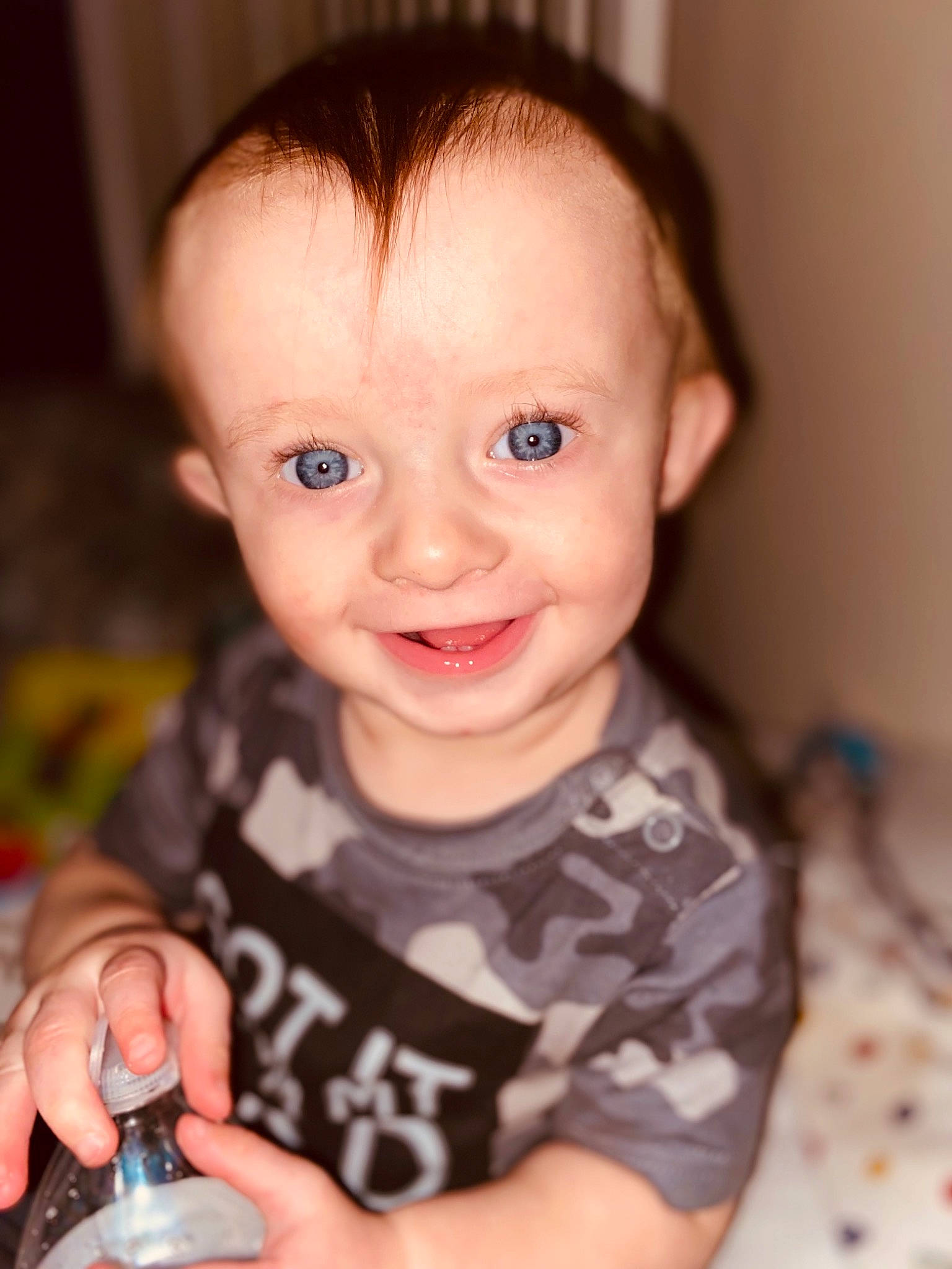 River is registered to the contest to win money with this photo: arm, baby, baby_toddler_clothing, cheek, chin, dress, eye, eyebrow, eyelash, finger, hand, happy, iris, joy, lip, mouth, nose, person, skin, sleeve