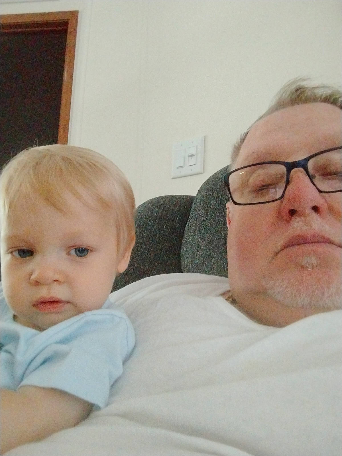 Mason joined the competition — help win amazing prizes! adult, blue_eyes, casual, chair, child, comfort, curious, face, family, glasses, home, indoor, light_hair, man, person, portrait, relaxing, seated, toddler, white_shirt