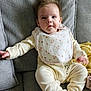 Olivia-Rose joined the competition — help win amazing prizes! baby, bib, bodypart, chair, clothing, couch, cushion, face, finger, furniture, hand, head, homedecor, longsleeve, pants, person, photography, portrait, sitting, sleeve