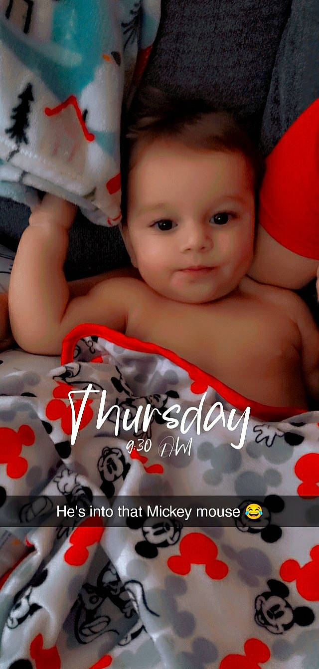 Declan is registered to the contest to win money with this photo: arm, baby, baby_toddler_clothing, black_hair, child, eyelash, finger, flash_photography, font, fun, hairstyle, hand, happy, mouth, muscle, person, photo_caption, skin, snapshot, thigh