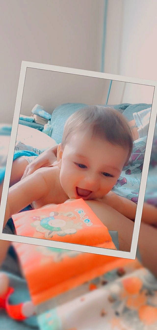 Declan is registered to the contest to win money with this photo: baby, baby_products, baby_toddler_clothing, cheek, child, eyebrow, finger, flooring, fun, hand, happy, iris, leisure, person, play, room, sitting, skin, smile, toddler