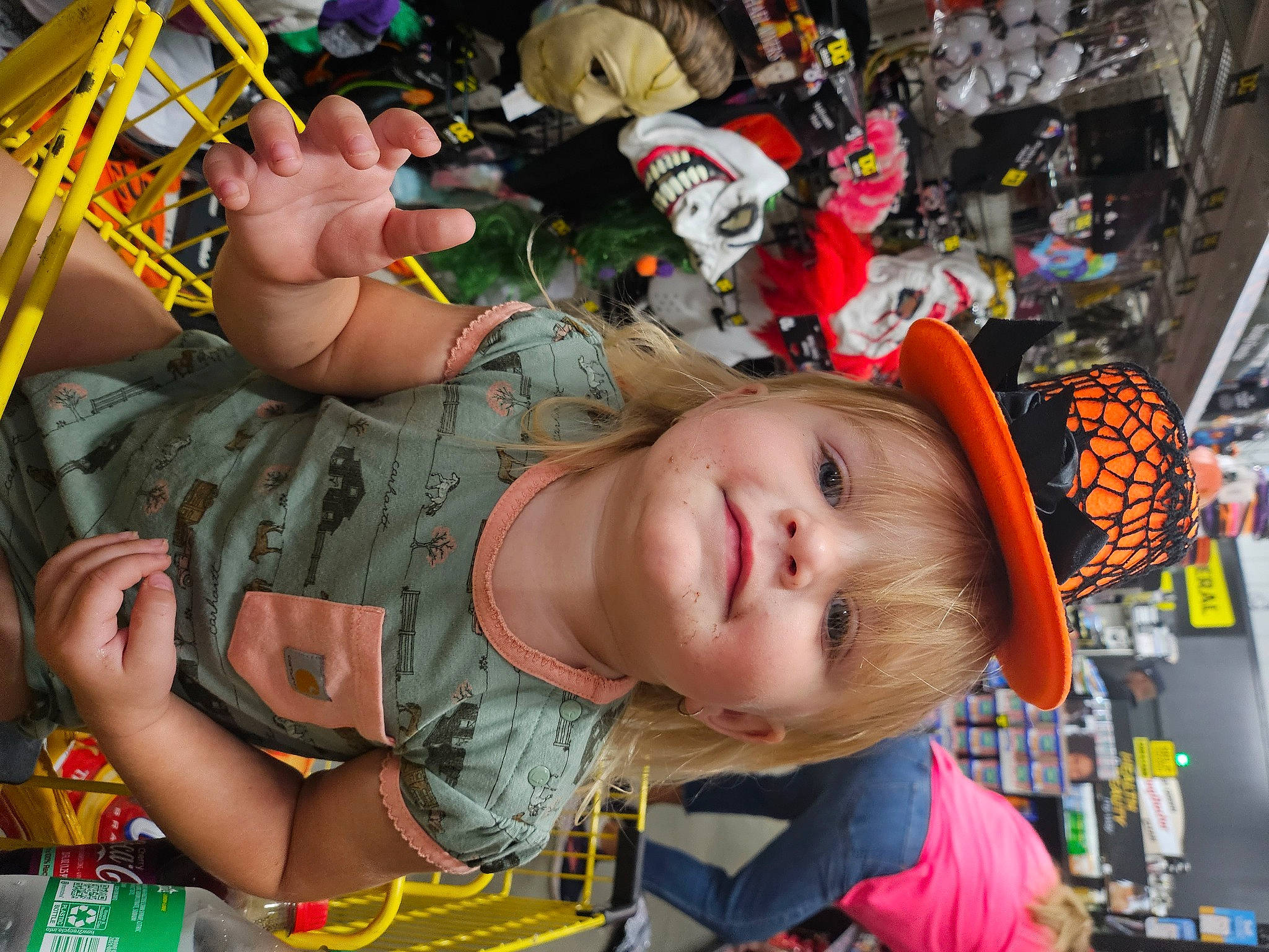 Breonna is registered to the contest to win money with this photo: baby, cap, child, costume, event, eyewear, fashion_accessory, fun, happy, hat, headgear, leisure, orange, pattern, person, personal_protective_equipment, smile, t_shirt, textile, toddler