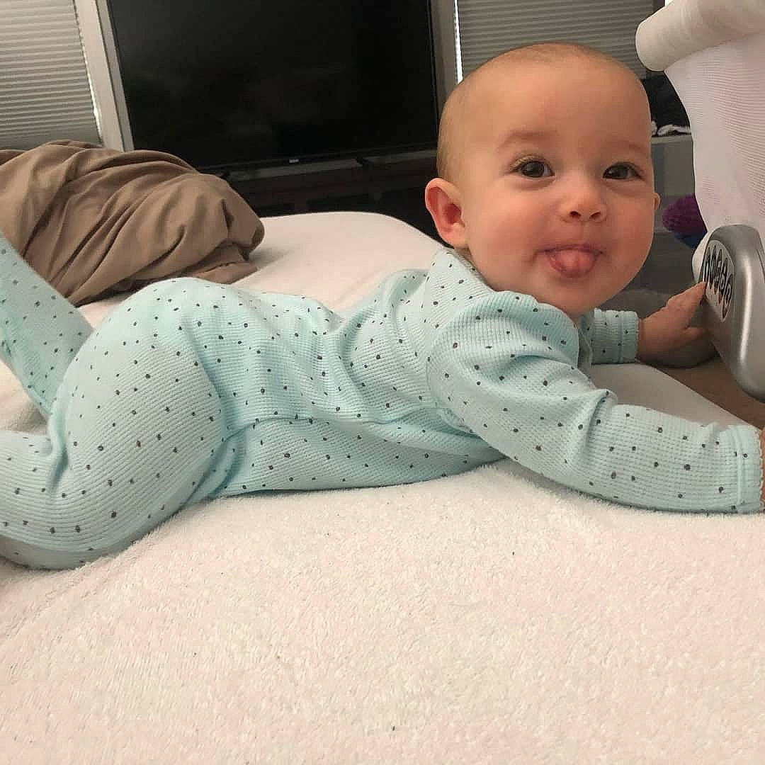 Iyla is registered to the contest to win money with this photo: arm, baby, baby_safety, baby_sleeping, birth, child, comfort, ear, flooring, head, leg, nap, person, play, product, room, sitting, skin, sleep, toddler