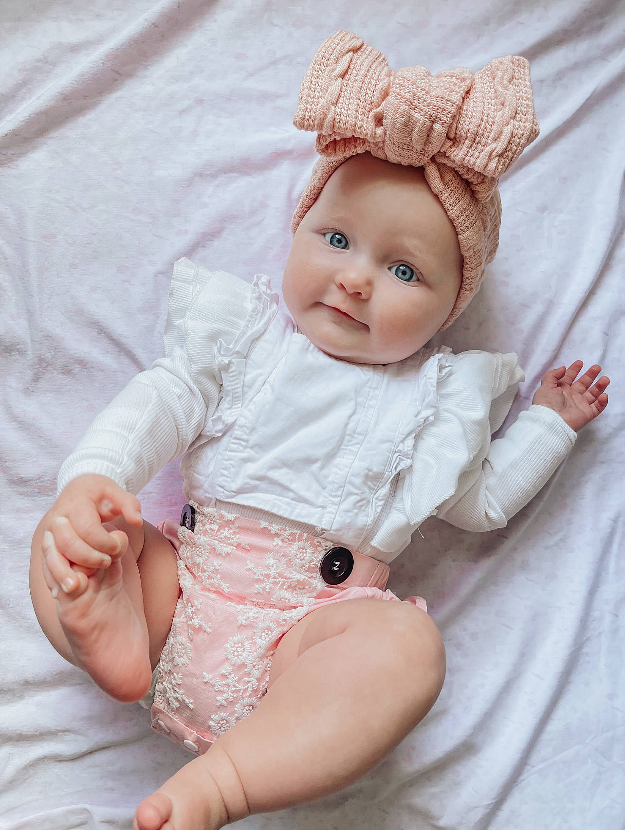 Hadleigh joined the competition — help win amazing prizes! baby, baby_sleeping, baby_toddler_clothing, cap, cheek, chin, comfort, eye, face, gesture, happy, headgear, linens, lip, person, pink, skin, sleeve, smile, thigh