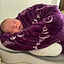 baby, blanket, purple, sleeping, infant, face, cushion, bed, soft, cozy, indoor, person, child, wrapped, head, rest, home, comfort, peaceful, sleep