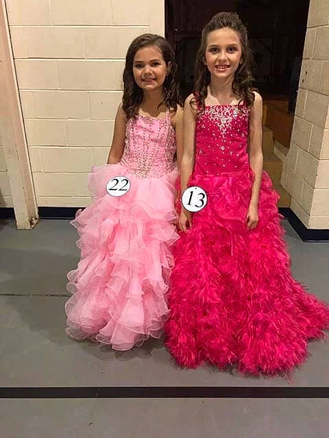 Abbagail is registered to the contest to win money with this photo: a_line, bridal_party_dress, child, child_model, clothing, cocktail_dress, dress, event, fashion, fashion_design, formal_wear, gown, haute_couture, joy, magenta, peach, person, pink, prom, quinceanera