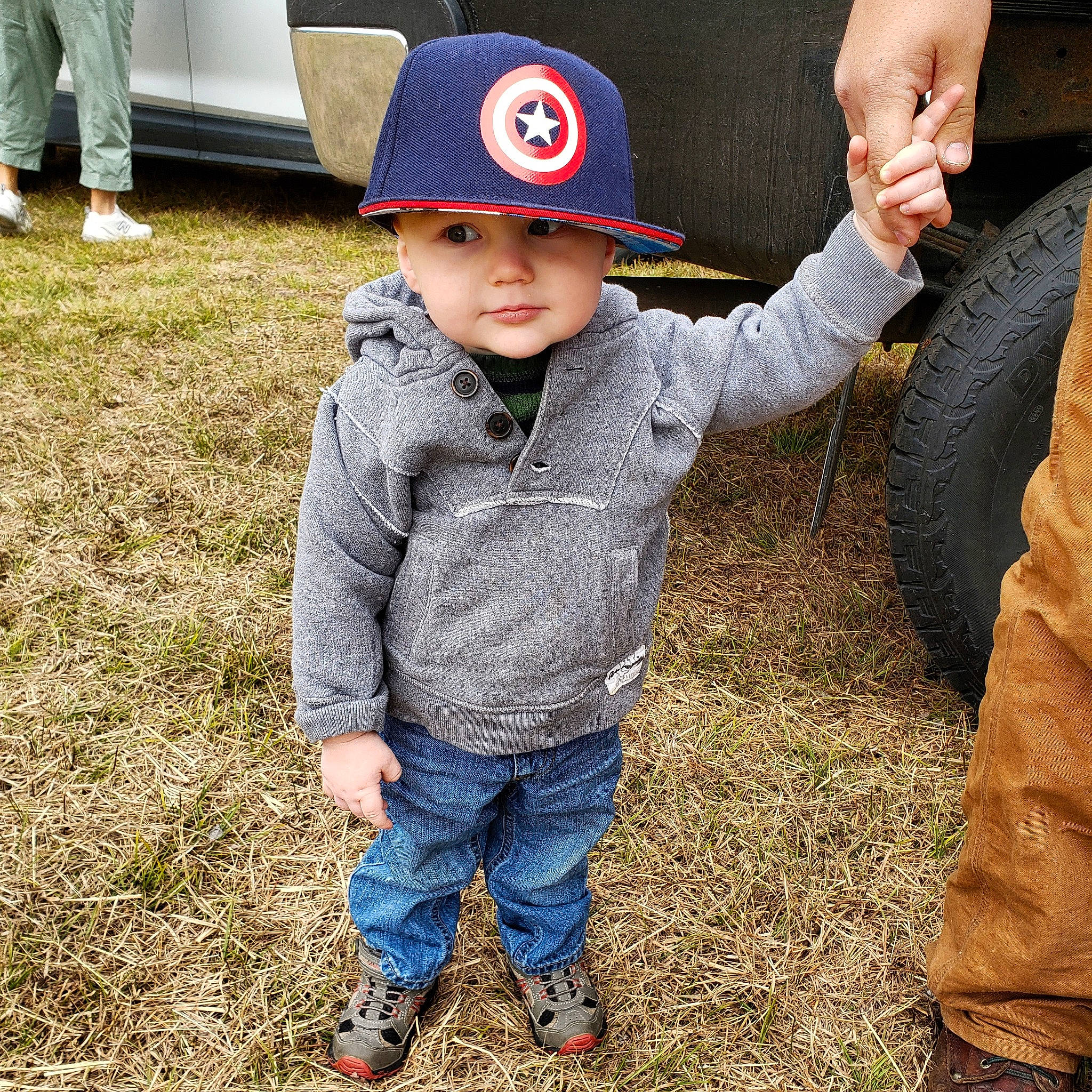 Dana is registered to the contest to win money with this photo: cap, child, cool, denim, fun, hat, headgear, headwear, jacket, jeans, male, outerwear, person, plant, play, shoe, sleeve, t_shirt, toddler