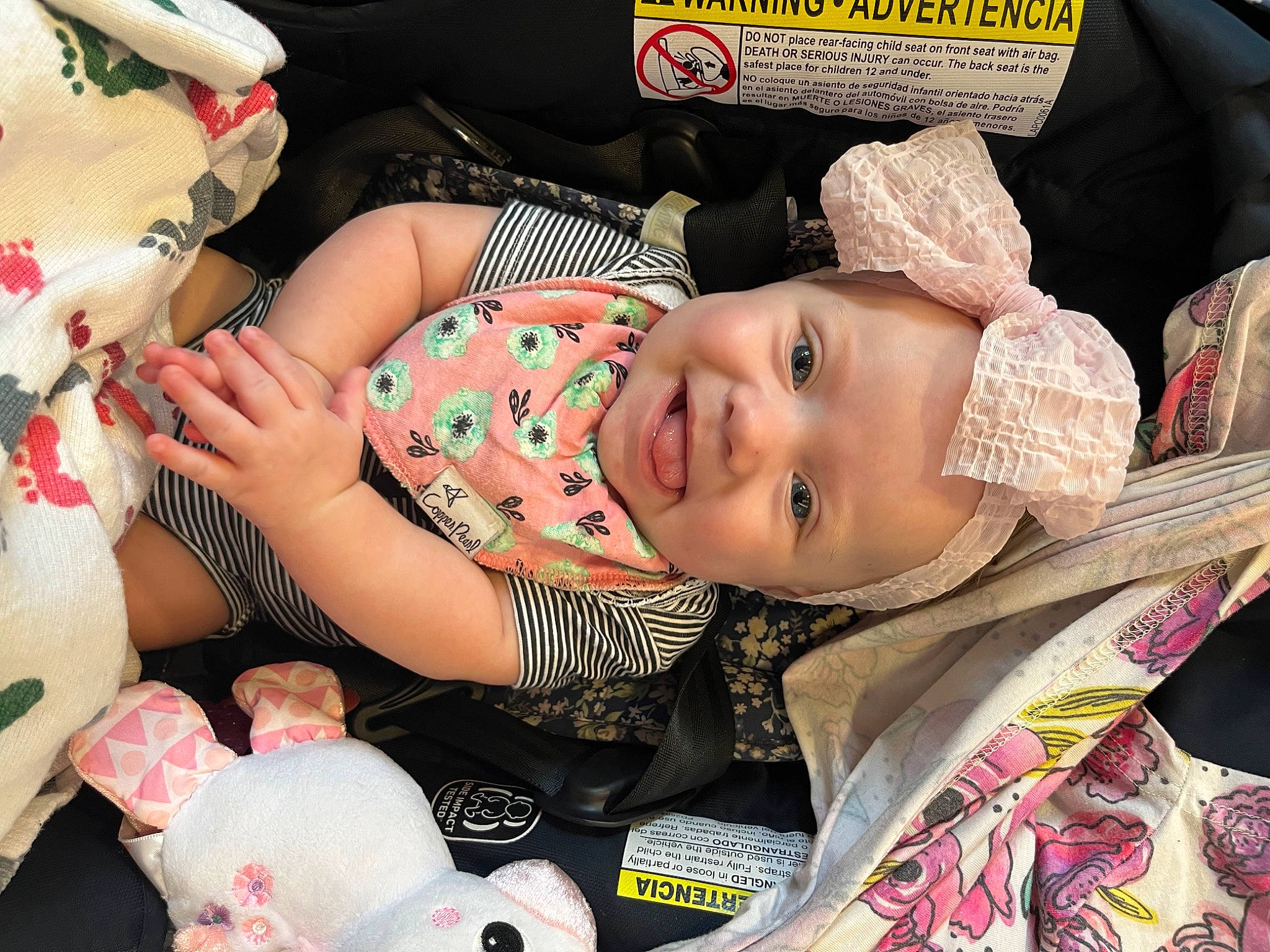 Ayva is registered to the contest to win money with this photo: baby, baby_carriage, baby_products, baby_toddler_clothing, car_seat, cheek, child, comfort, event, fashion_accessory, fun, happy, hat, headwear, pattern, person, pink, skin, smile, toddler