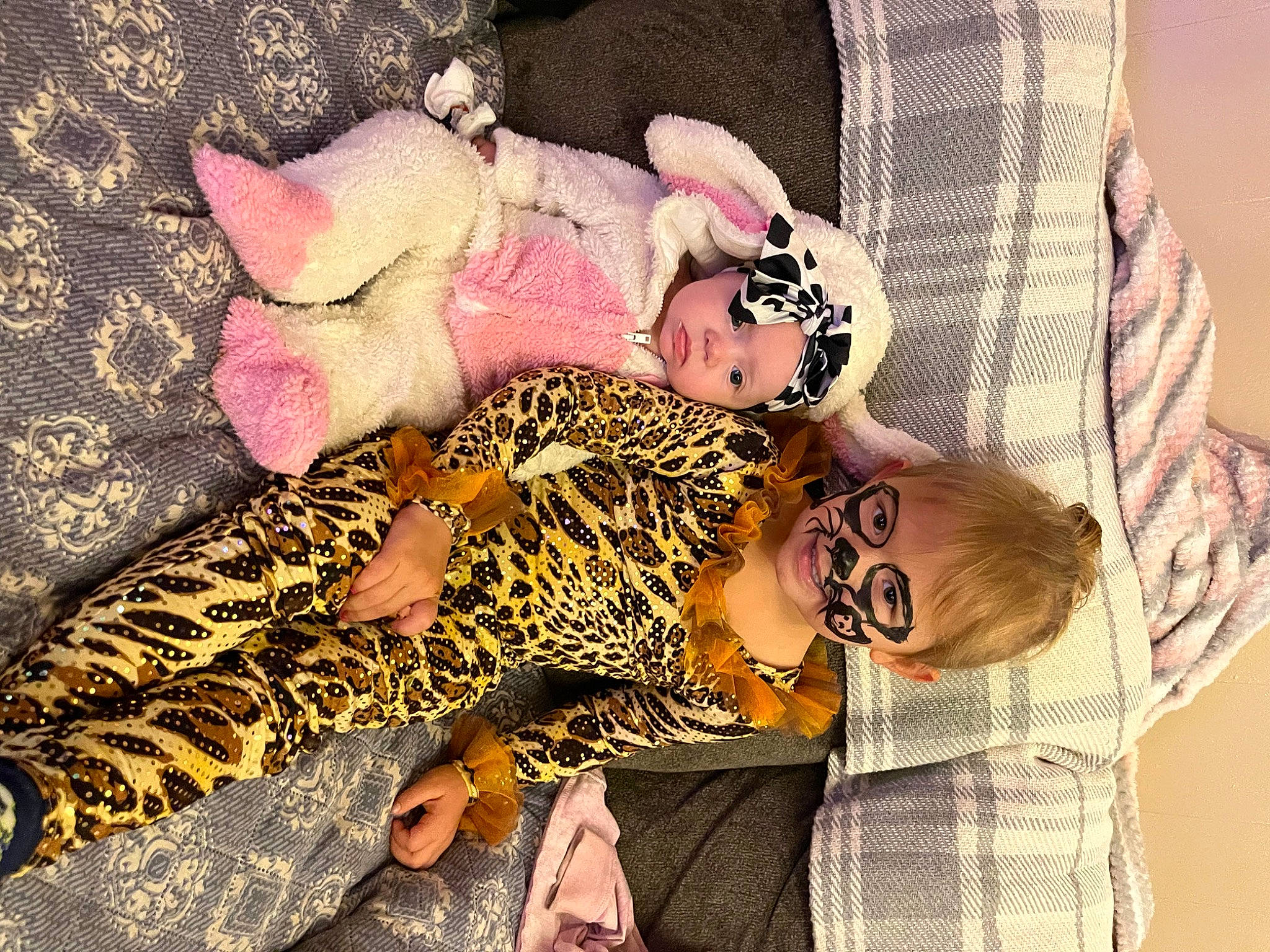 Zailey is registered to the contest to win money with this photo: baby, baby_toddler_clothing, comfort, eyewear, fashion_design, foot, fur, happy, headwear, human_leg, linens, pattern, person, plaid, room, sleeve, stuffed_toy, sunglasses, textile, thigh