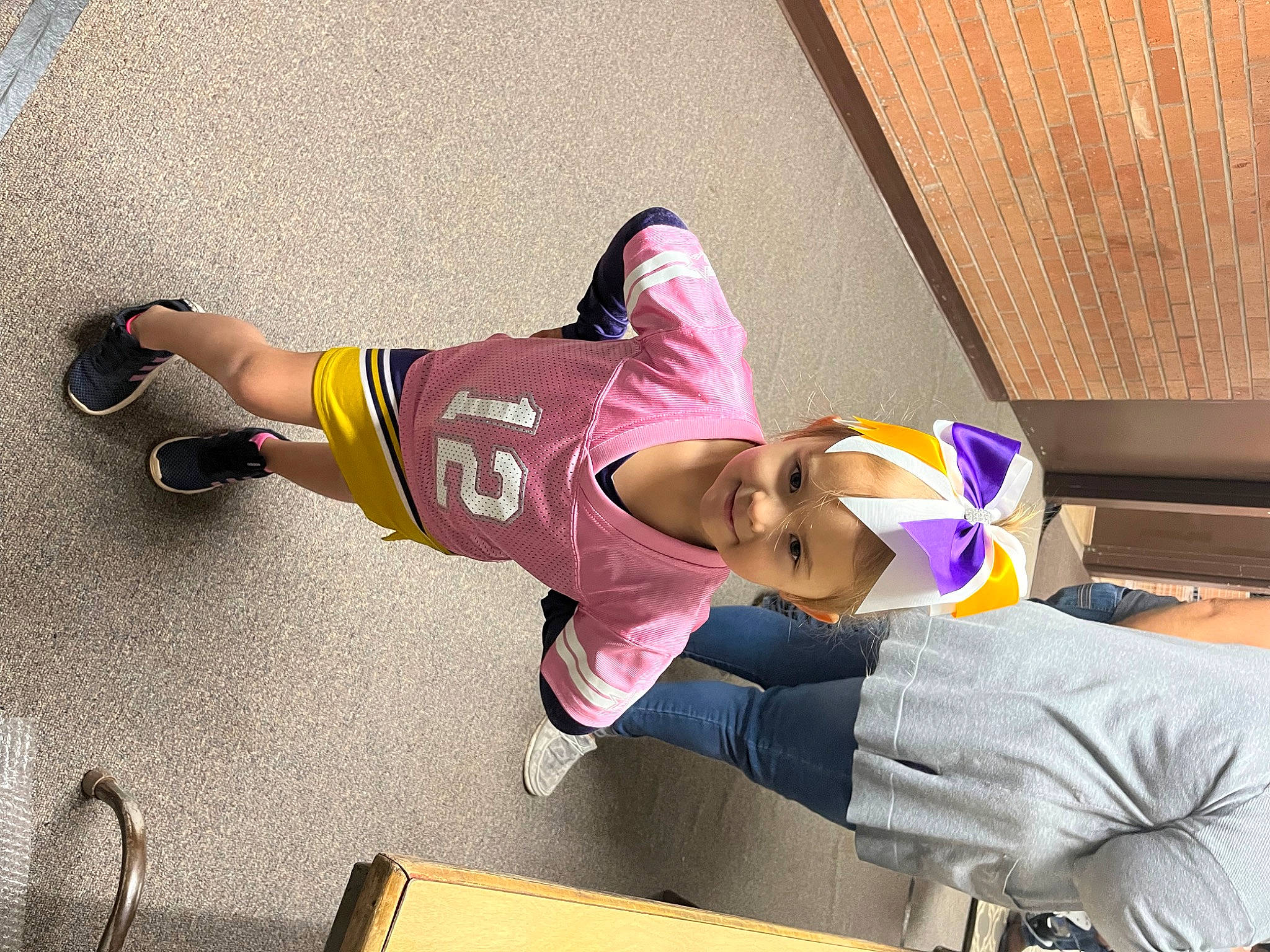 Zailey joined the competition — help win amazing prizes! calf, carmine, elbow, foot, fun, hat, headwear, human_leg, joy, knee, leisure, magenta, person, physical_fitness, room, sandal, sportswear, t_shirt, thigh