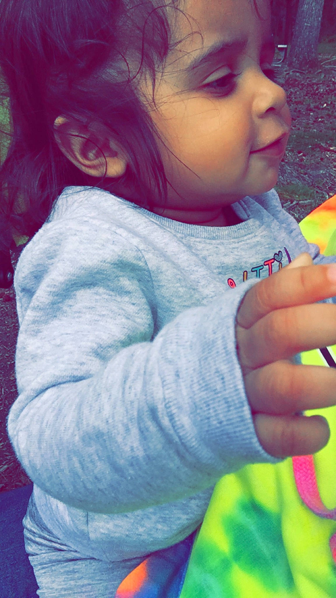 Amilya is registered to the contest to win money with this photo: baby_toddler_clothing, child, cool, electric_blue, finger, fun, gesture, grass, happy, headwear, lip, nail, nose, people_in_nature, person, pink, play, skin, sleeve, t_shirt