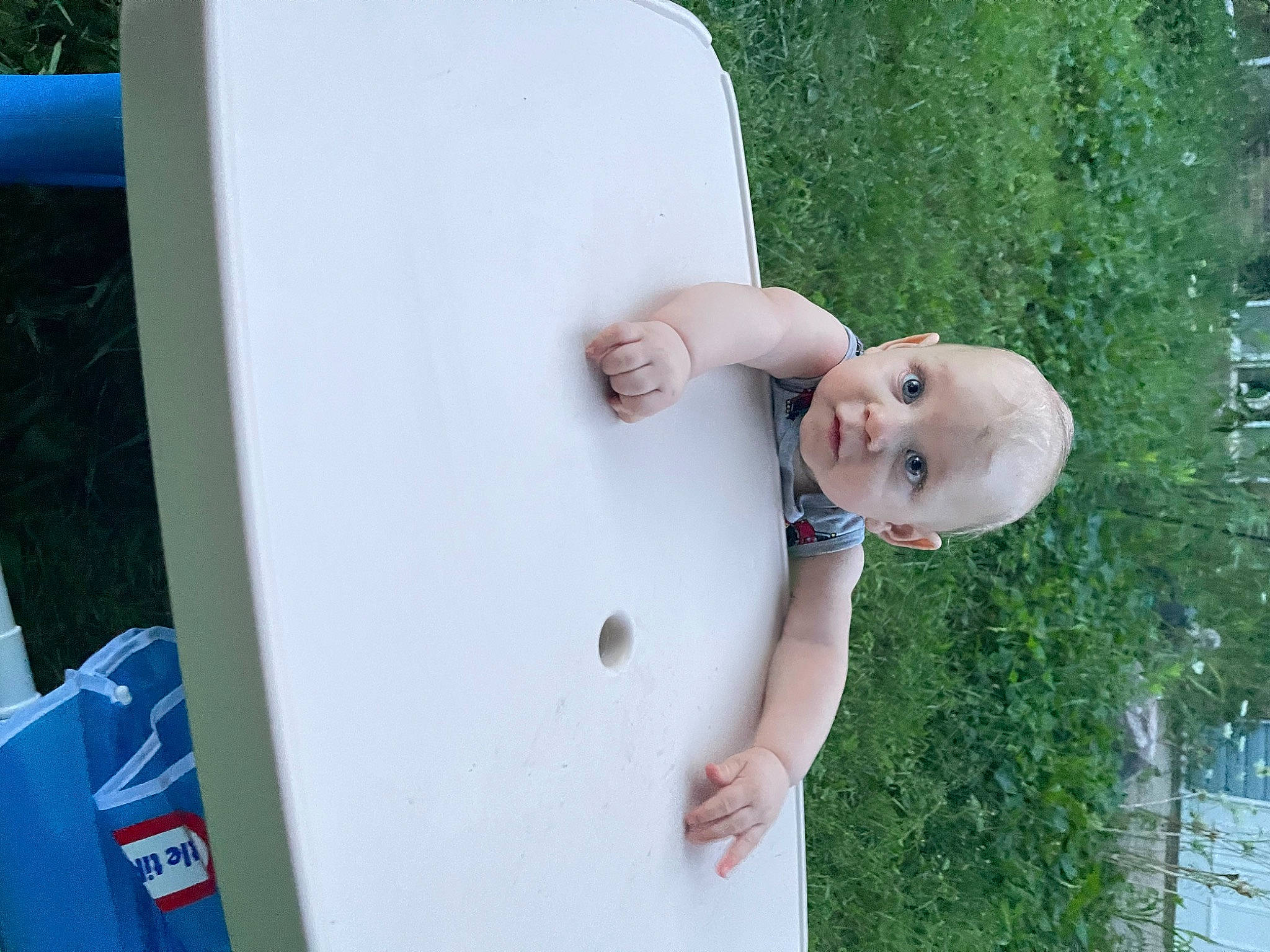 Casey is registered to the contest to win money with this photo: baby, child, elbow, fun, grass, happy, leisure, pattern, person, plant, sitting, smile, standing, toddler, yard