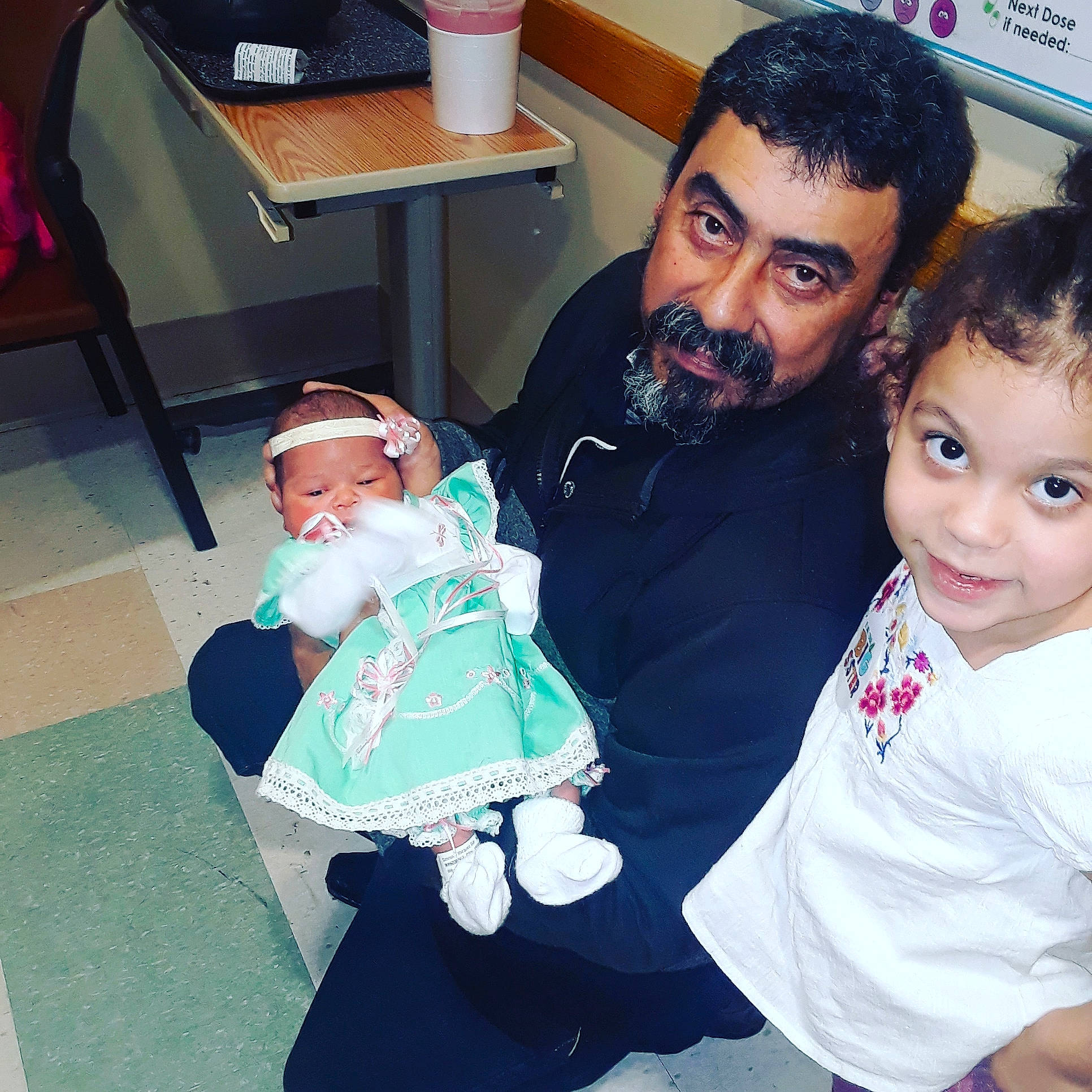 Ana Sofia is registered to the contest to win money with this photo: baby, black_hair, child, cool, daughter, eye, family, father, happy, head, lap, mother, people, person, selfie, smile, toddler