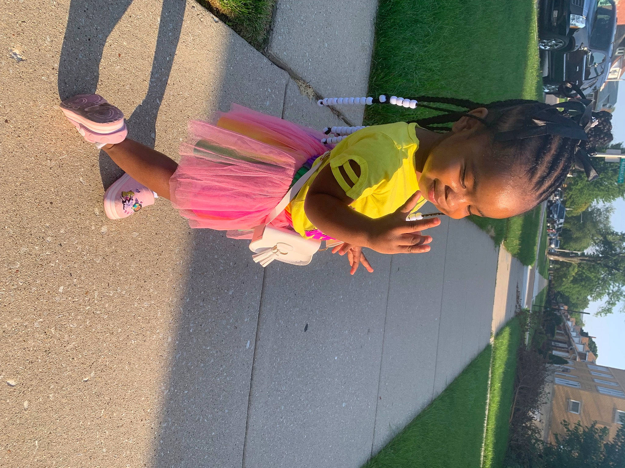 Kylann is registered to the contest to win money with this photo: child, fun, grass, green, leisure, magenta, person, plant, play, recreation, sandal, shadow, sky, smile, toddler, tree