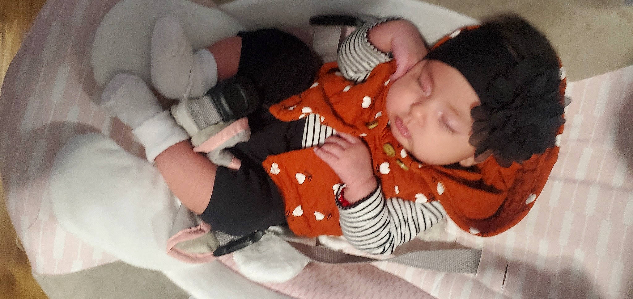 Aryanna joined the competition — help win amazing prizes! arm, baby, baby_toddler_clothing, child, comfort, eyelash, finger, gesture, hand, headwear, human_body, joint, nail, orange, pattern, person, personal_protective_equipment, skin, thigh, thumb