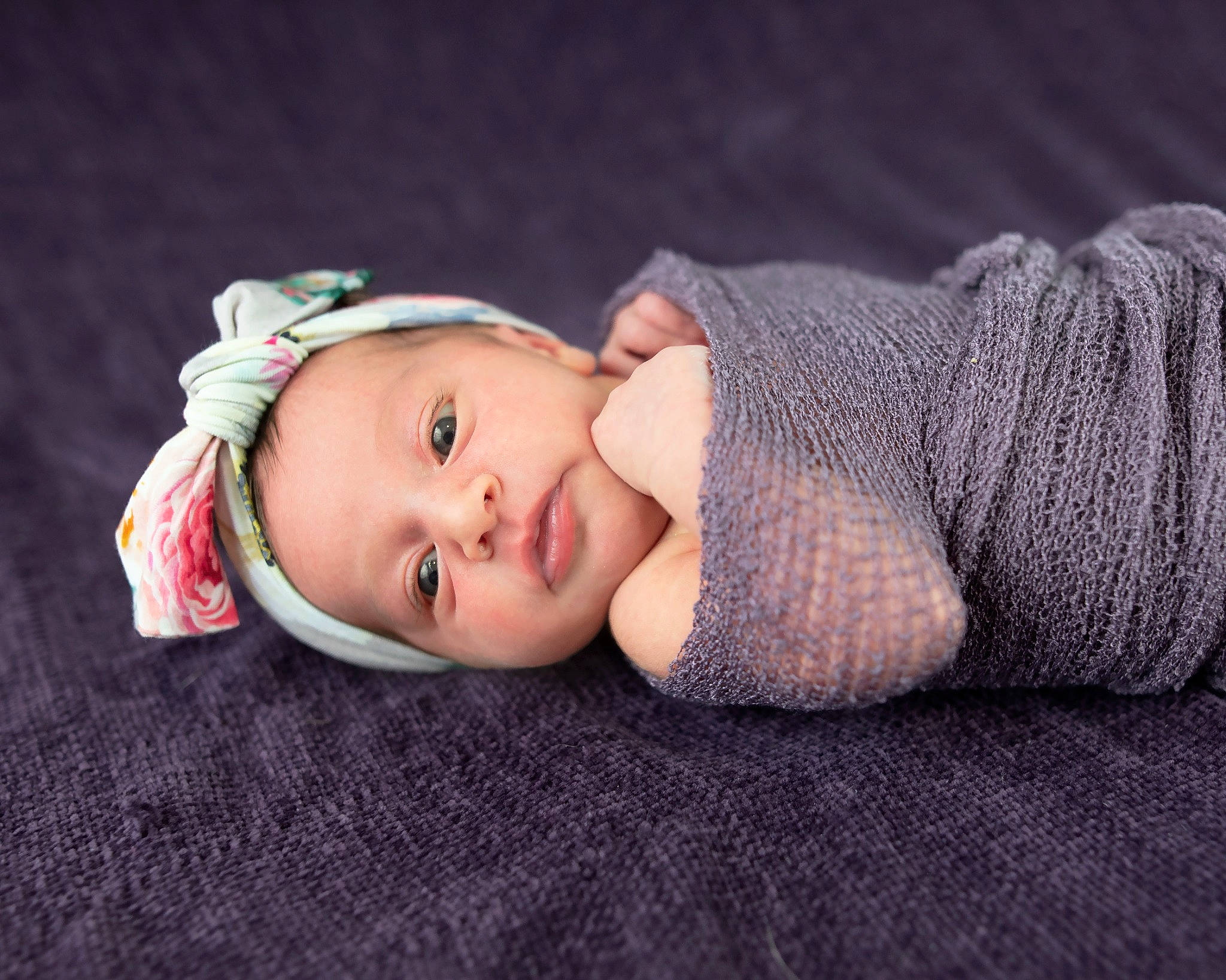 Kelsey is registered to the contest to win money with this photo: baby, baby_toddler_clothing, cheek, child, comfort, eye, eyelash, fashion_accessory, flash_photography, hat, head, headgear, human_body, knit_cap, lip, pattern, person, sitting, sleeve, toddler