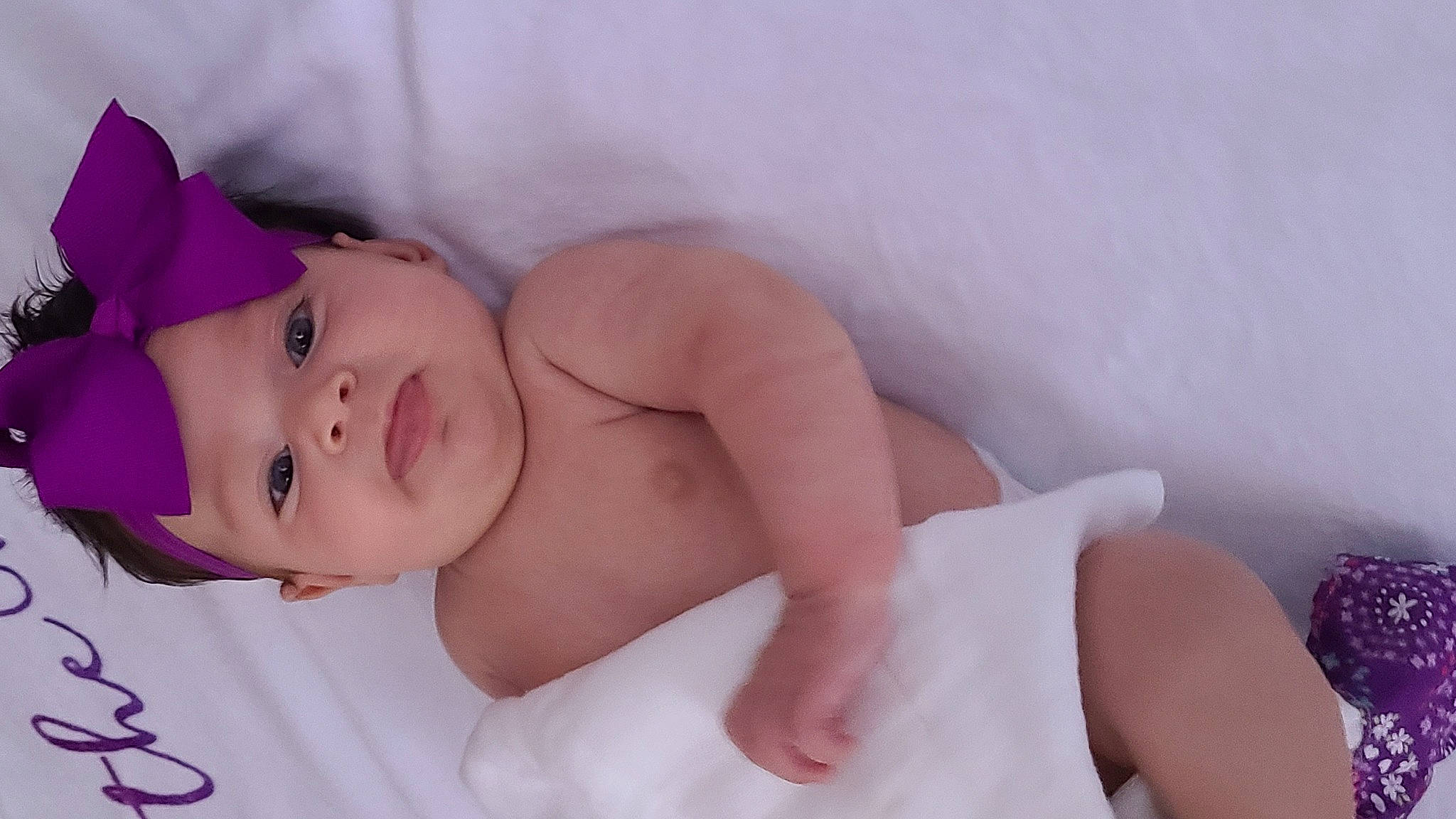 Kelsey is registered to the contest to win money with this photo: abdomen, baby, baby_products, baby_sleeping, baby_toddler_clothing, bedding, child, comfort, fashion_accessory, glasses, happy, hat, headwear, linens, pattern, person, pink, portrait_photography, skin, sleeve