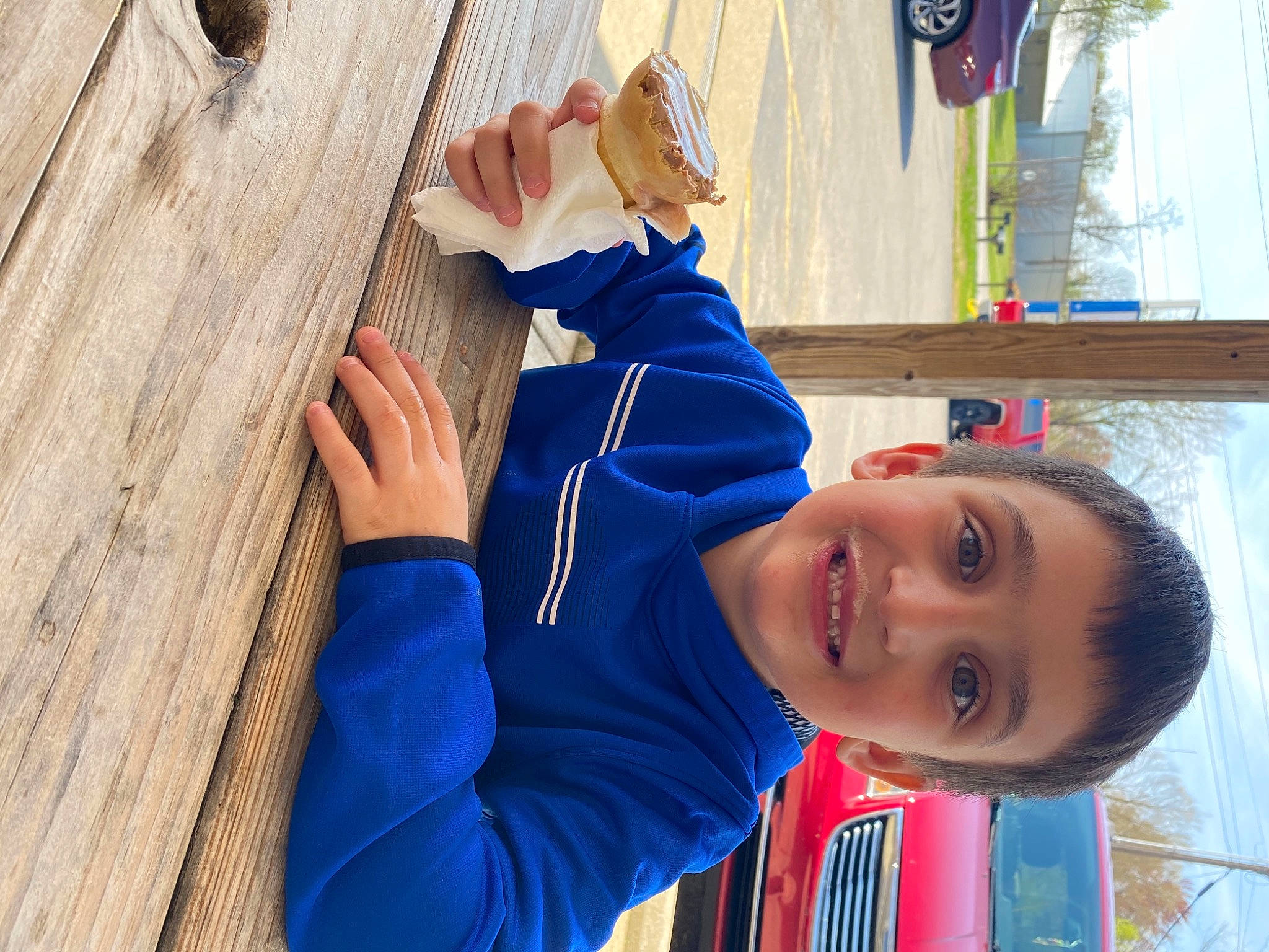 Larenzo is registered to the contest to win money with this photo: baseball_cap, child, elbow, electric_blue, finger, fun, happy, hardwood, hat, joy, leisure, people, person, room, smile, t_shirt, thumb, toddler, travel, white