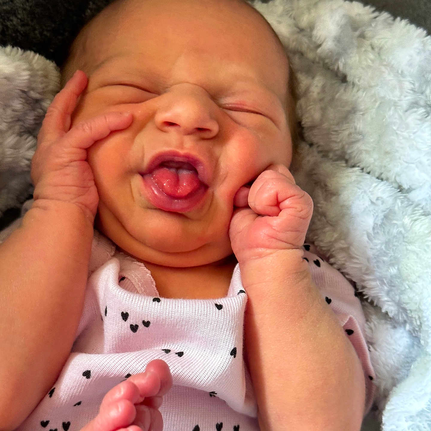 Noel is registered to the contest to win money with this photo: baby, babylaughing, blanket, bodypart, clothing, face, finger, hand, happy, head, laughing, mouth, newborn, person, photography, portrait, quilt, sleeping, smile, yawning