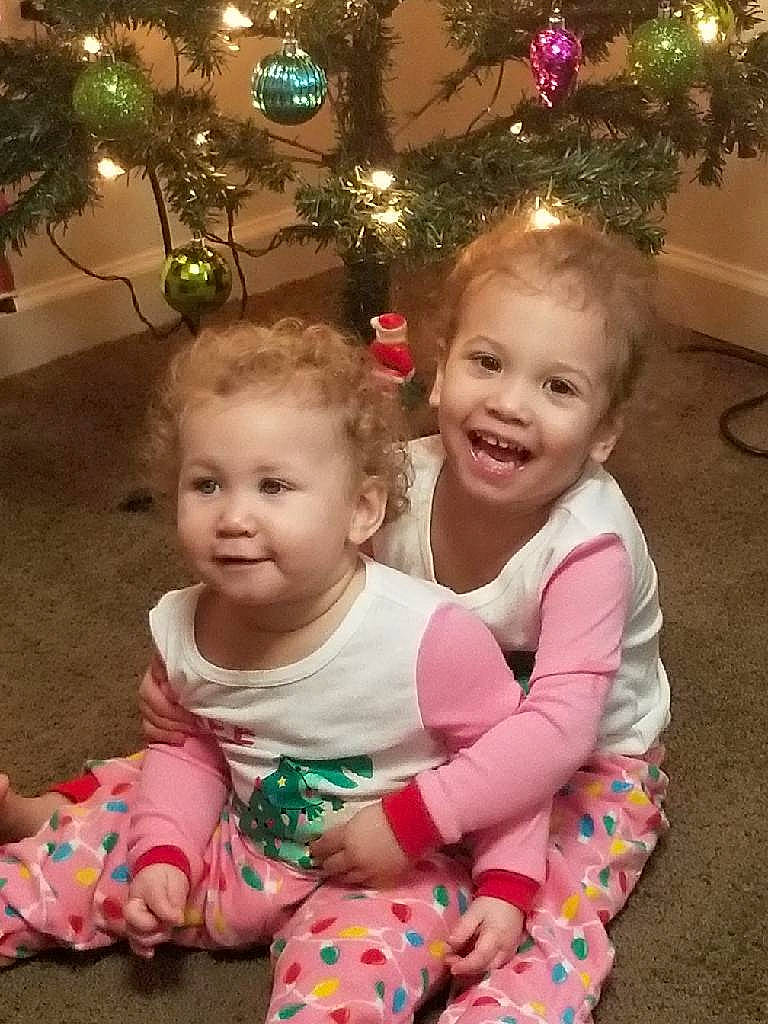 Savannah joined the competition — help win amazing prizes! arm, baby_toddler_clothing, cheek, child, christmas_decoration, ear, face, facial_expression, hand, happy, head, holiday, human, human_body, joy, mouth, nose, person, pink, sitting