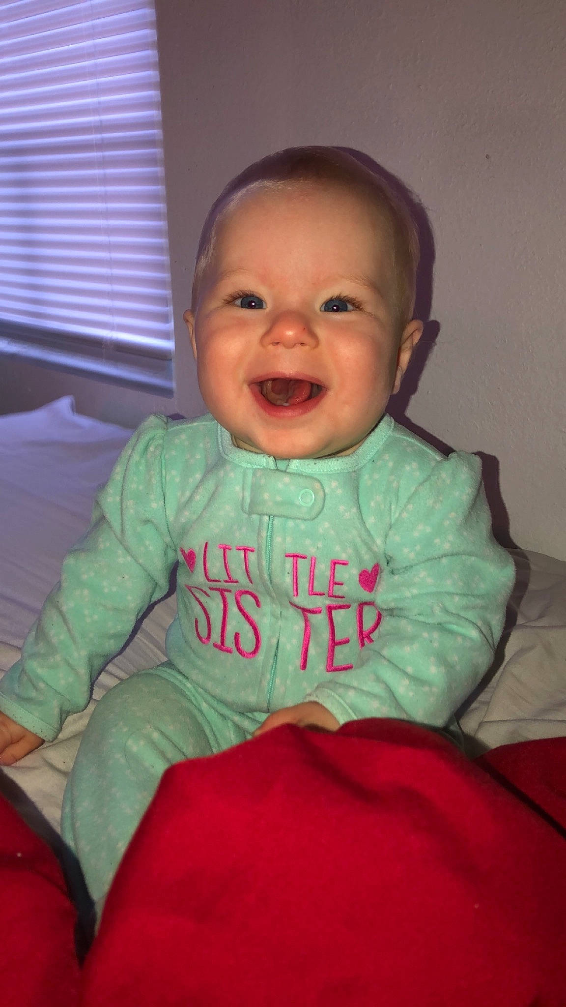 Emberlee is registered to the contest to win money with this photo: baby, baby_toddler_clothing, cheek, child, chin, eye, face, facial_expression, happy, head, laugh, lip, mouth, person, sitting, skin, smile, toddler