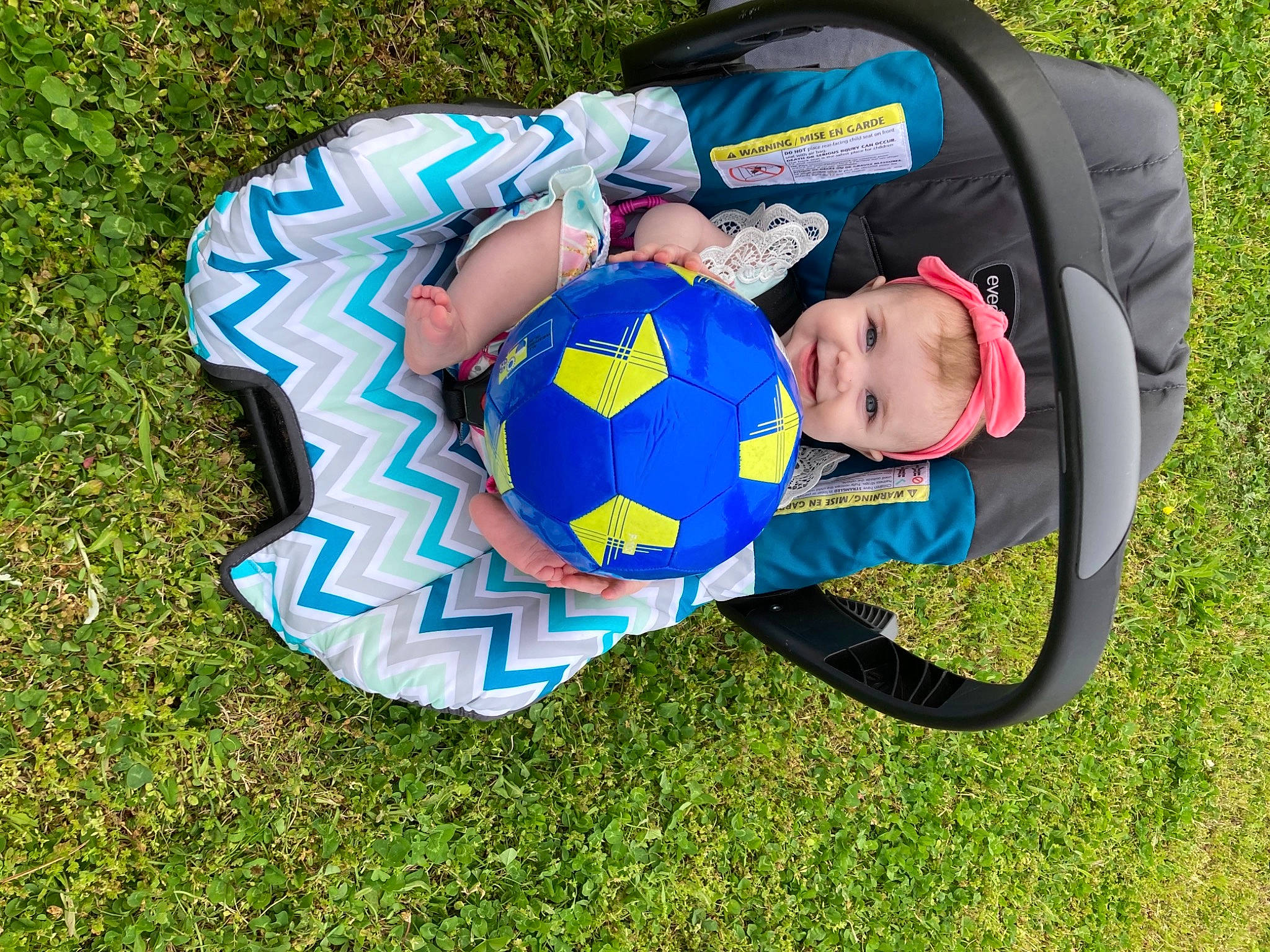 Libby joined the competition — help win amazing prizes! baby, baby_products, baby_toddler_clothing, ball, comfort, electric_blue, football, fun, grass, grassland, happy, hat, joy, lawn, leisure, people_in_nature, person, personal_protective_equipment, plant, recreation