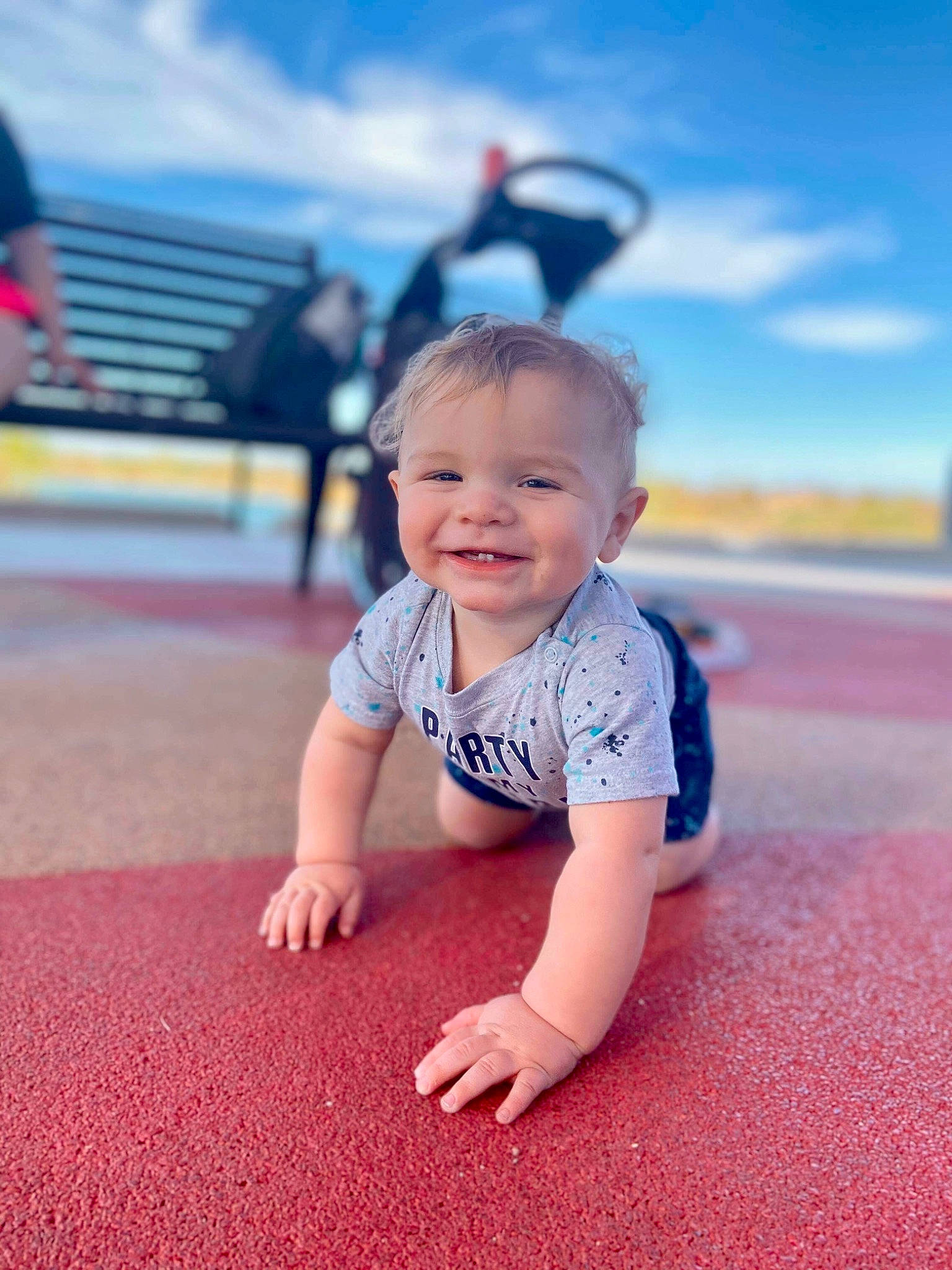 Augustus is registered to the contest to win money with this photo: baby, baby_toddler_clothing, child, city, cloud, flash_photography, flooring, fun, grass, happy, joy, leisure, people, people_in_nature, person, recreation, sitting, skin, sky, smile