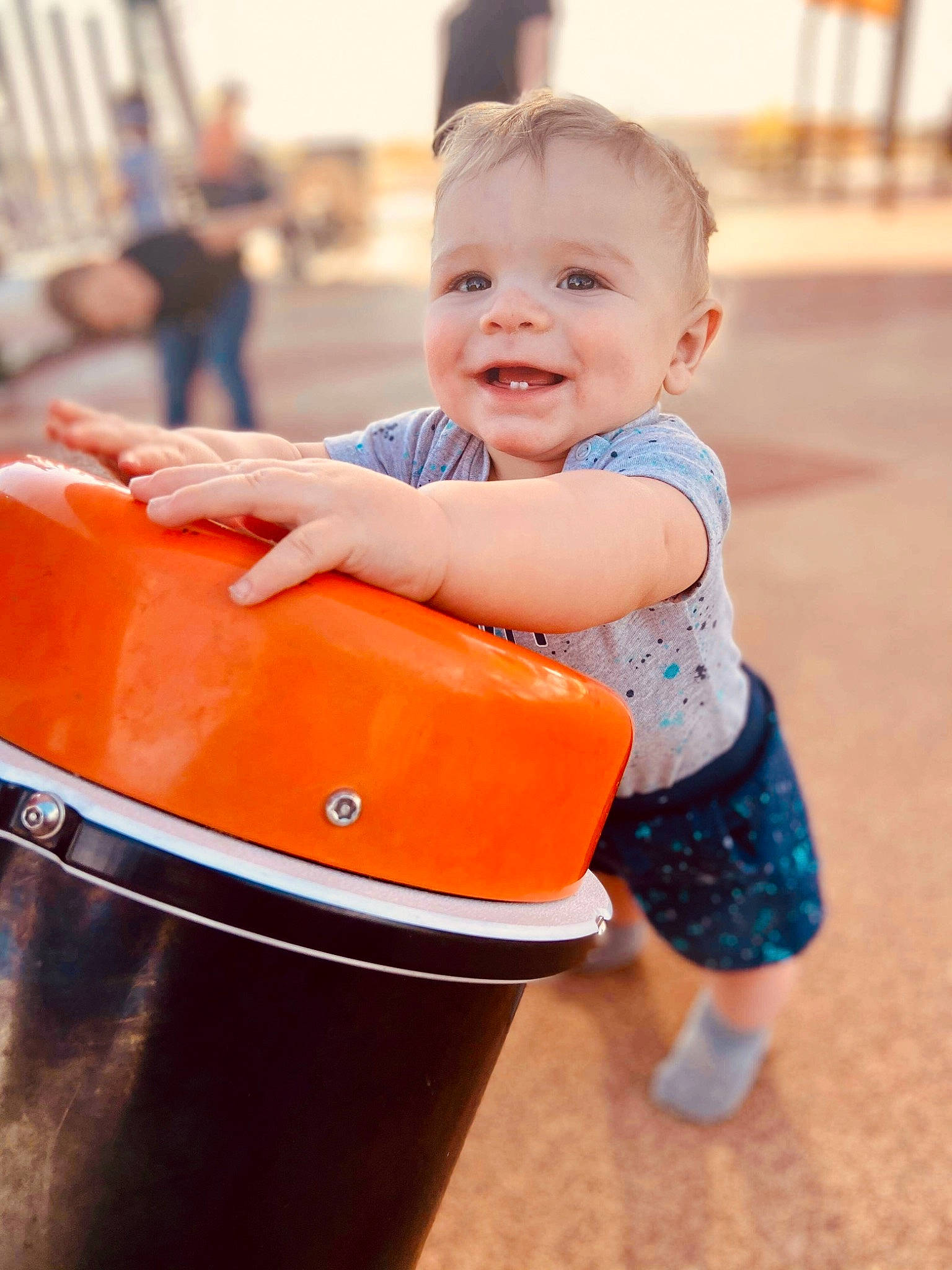 Augustus joined the competition — help win amazing prizes! baby, baby_toddler_clothing, child, electric_blue, fun, gas, happy, joy, leisure, orange, person, plastic, recreation, shorts, sitting, sleeve, smile, standing, t_shirt, toddler
