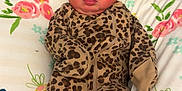 Wynter is registered to the contest to win money with this photo: baby, blanket, bow, closed_eyes, cozy, cute, floral, headband, hospital_bed, infant, leopard_print, maternity, newborn, nursery, onesie, pillow, portrait, skin, sleeping, soft_toys_absent