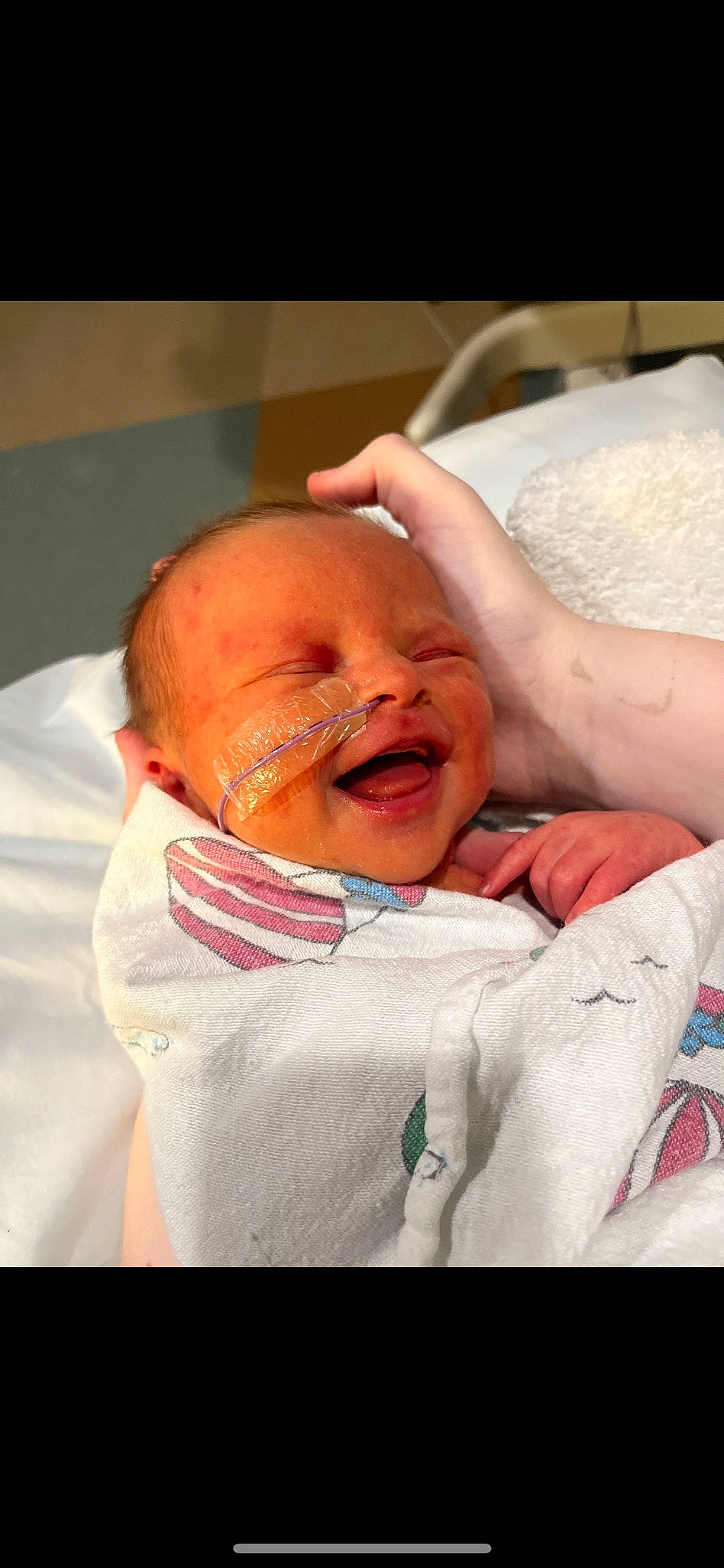 Arabella is registered to the contest to win money with this photo: baby, baby_products, baby_toddler_clothing, cheek, child, comfort, event, eyebrow, eyelash, fun, gesture, happy, lip, mouth, nose, person, skin, sleeve, smile, thumb