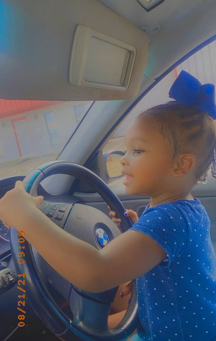 Jaiuni is registered to the contest to win money with this photo: auto_part, automotive_design, automotive_exterior, baby, baby_carriage, baby_products, car_seat, child, electric_blue, family_car, fun, health_care, leisure, person, service, skin, steering_wheel, toddler, vehicle_door, wheel