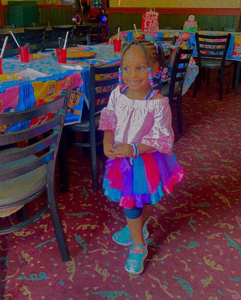 Jaiuni joined the competition — help win amazing prizes! chair, child, event, fashion_design, flooring, fun, furniture, joy, leisure, magenta, party, pattern, person, room, sandal, smile, sock, table, tablecloth, textile