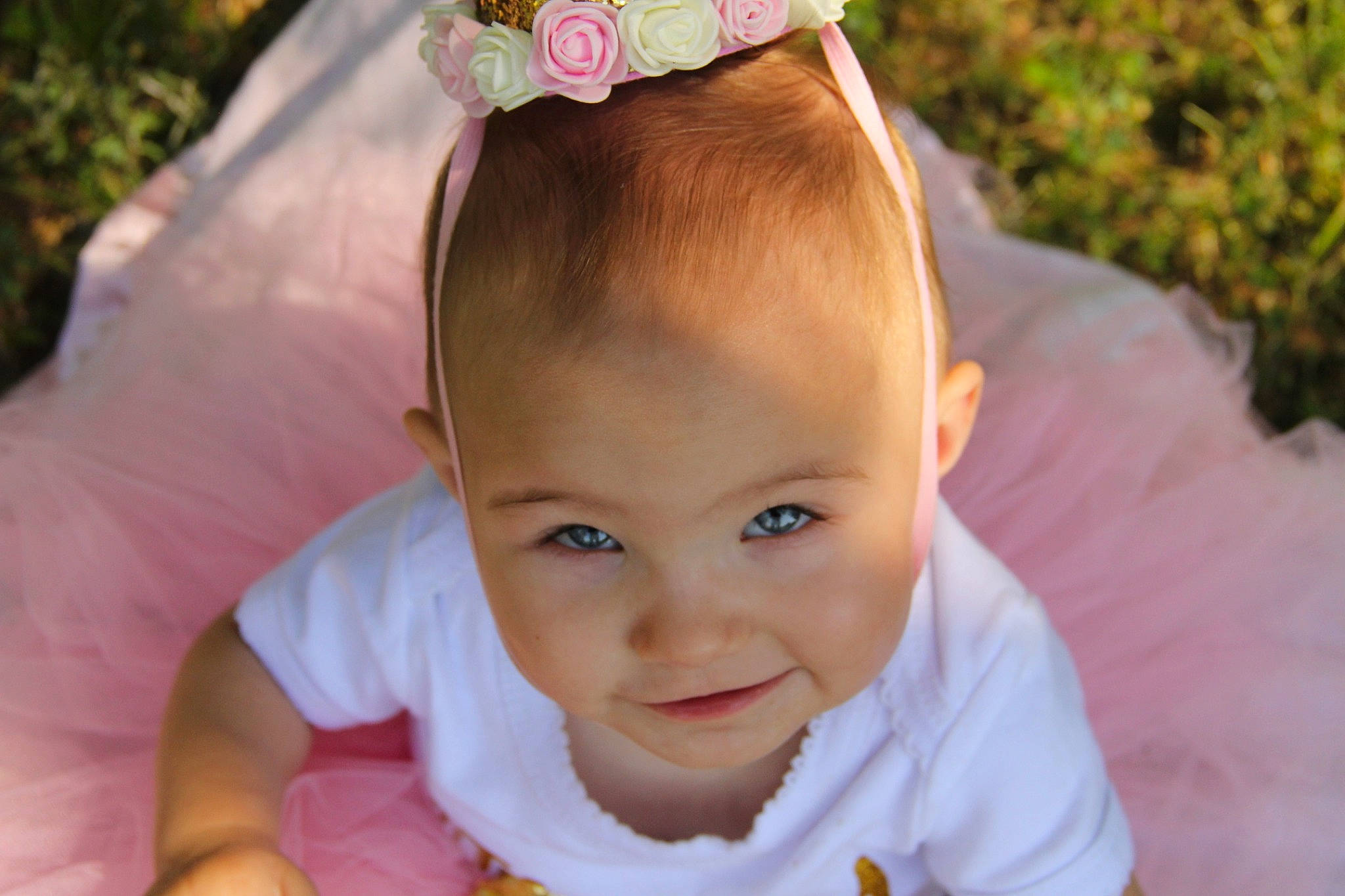 Arrabella is registered to the contest to win money with this photo: baby, brown_hair, child, ear, eye, fashion_accessory, hair, hair_accessory, head, headband, headgear, headpiece, lip, person, pink, skin, smile, toddler