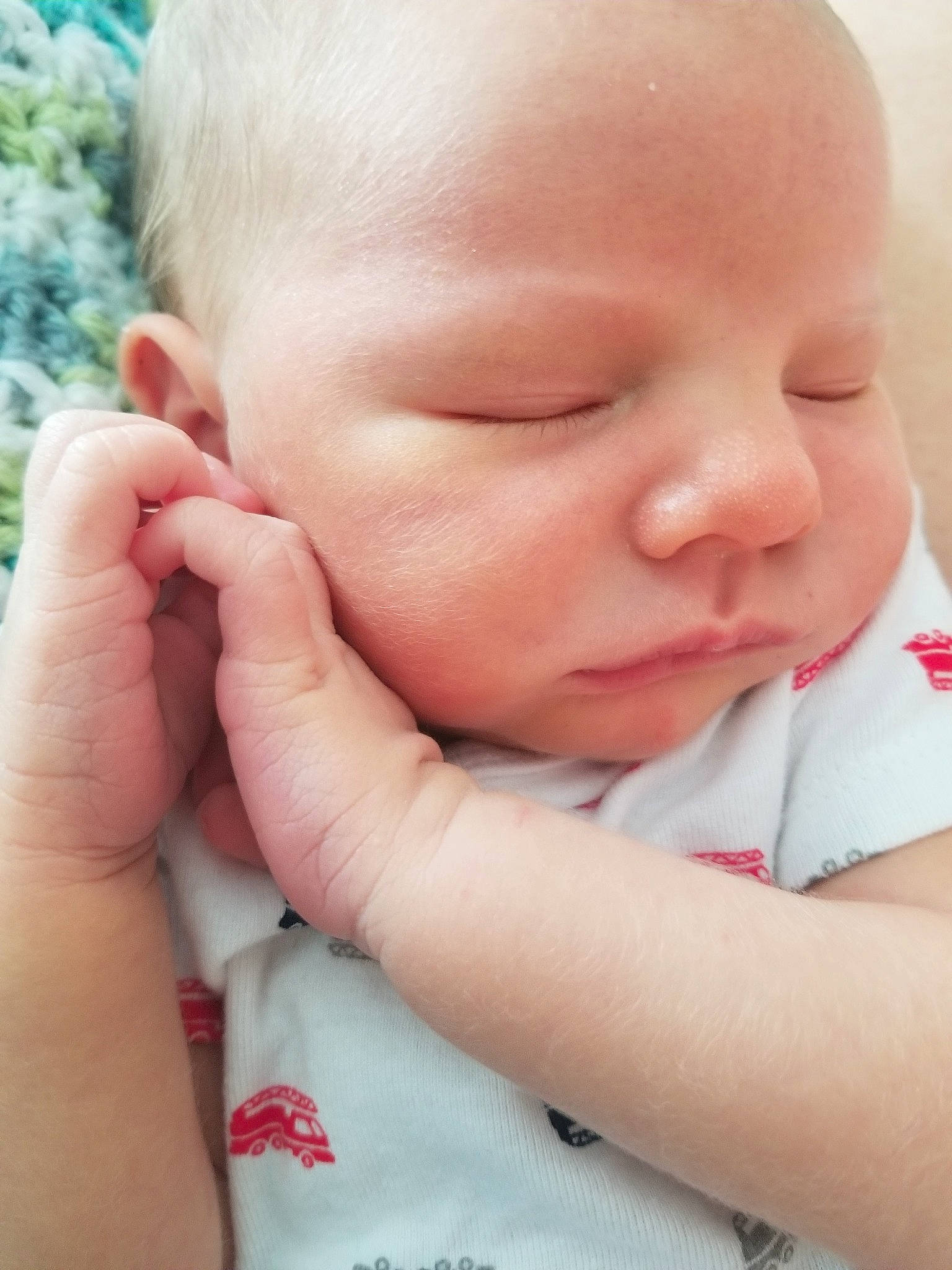 Ezra joined the competition — help win amazing prizes! baby, baby_sleeping, cheek, child, chin, close_up, ear, face, facial_expression, finger, forehead, gesture, hand, head, lip, mouth, nail, nose, person, skin