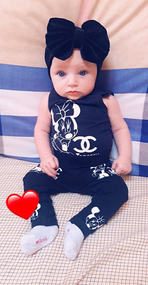 Tenessy participe au concours pour gagner de l'argent avec cette photo : baby, baby_toddler_clothing, beanie, black_hair, cap, child, clothing, doll, headgear, headwear, knit_cap, leg, leggings, person, skin, sleeve, t_shirt, tights, toddler, trousers