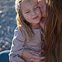 Veronika participe au concours pour gagner de l'argent avec cette photo : child, woman, kiss, affection, love, outdoor, portrait, blond_hair, long_hair, casual_clothing, close_up, hands, happy, smile, family, tenderness, light, nature, emotion, headband