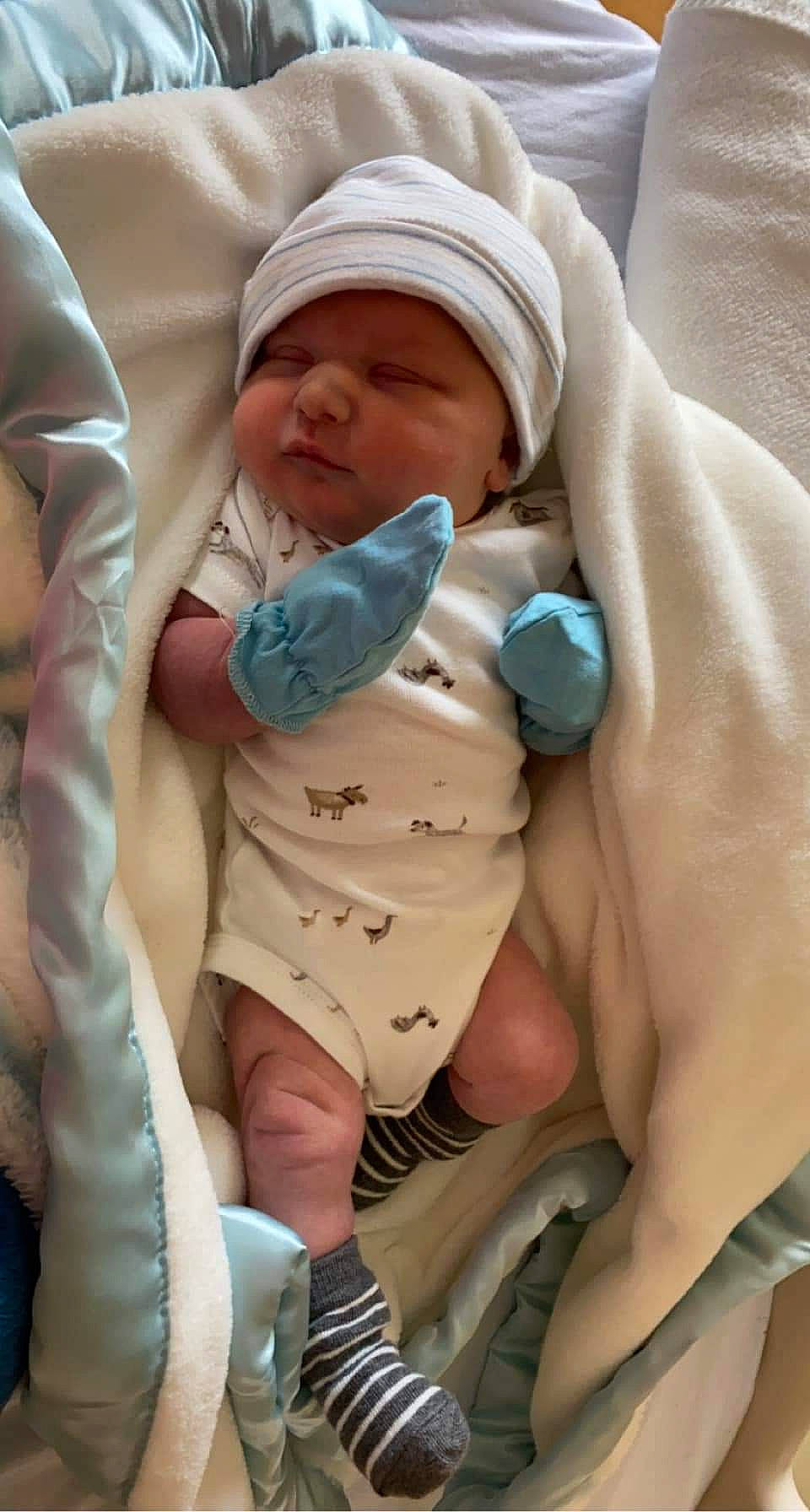 Brantley is registered to the contest to win money with this photo: abdomen, baby, baby_products, baby_safety, baby_sleeping, baby_toddler_clothing, child, comfort, gesture, hand, headwear, health_care, hospital, linens, nail, person, service, skin, thumb, toddler