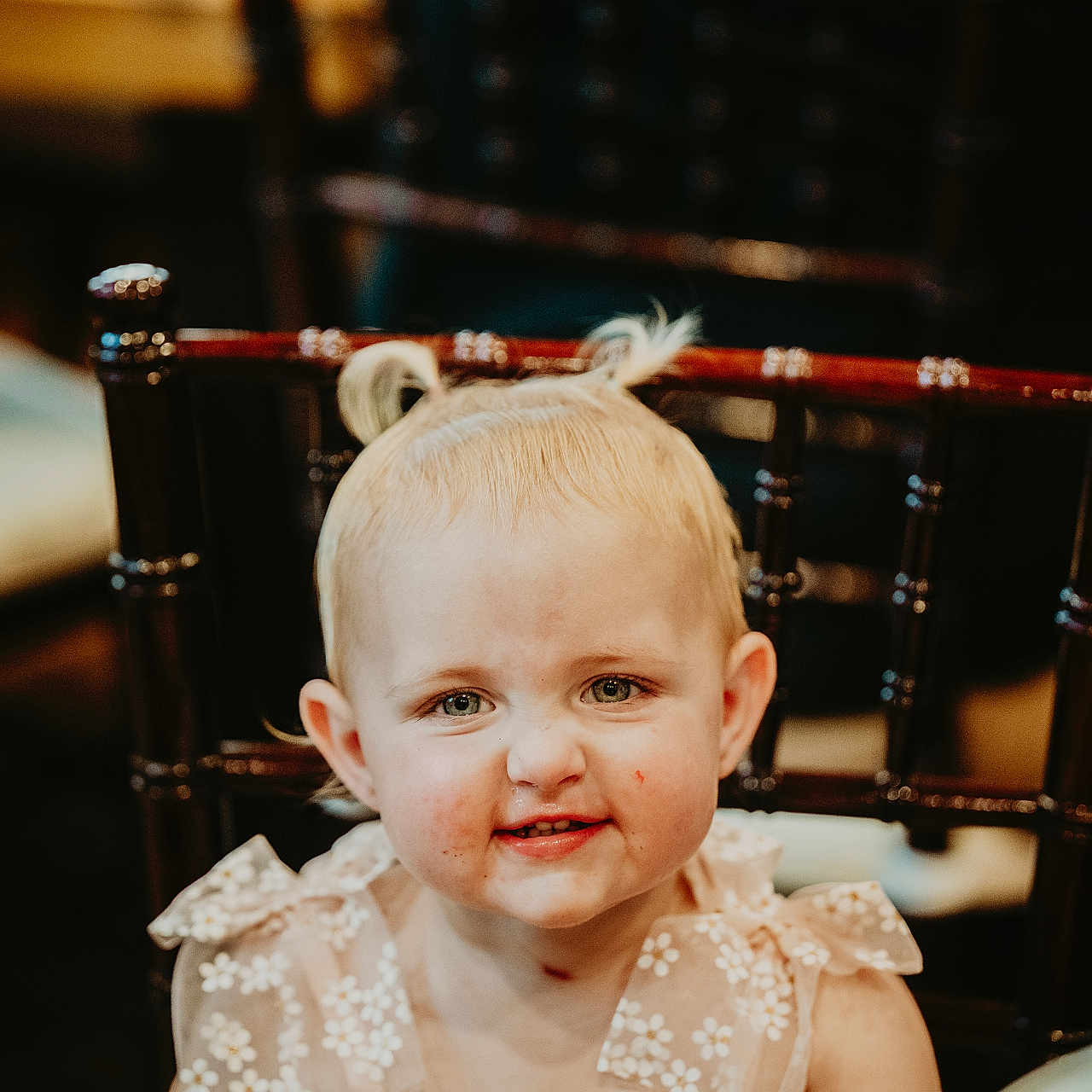 Adalynn joined the competition — help win amazing prizes! baby, bodypart, clothing, crib, dress, face, finger, furniture, hand, handrail, happy, hardwood, head, indoors, infantbed, person, photography, portrait, smile, wood
