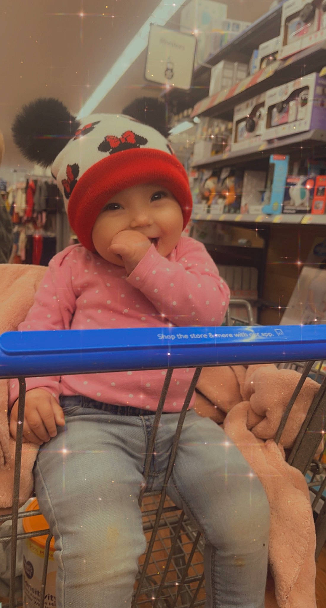 Kinsley is registered to the contest to win money with this photo: baby, baby_toddler_clothing, cap, cheek, child, comfort, event, fun, headwear, helmet, human_body, human_leg, leisure, person, personal_protective_equipment, product, retail, room, shelf, sitting