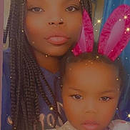 Shakur White joined the competition — help win amazing prizes! blue_clothing, braids, bunny_ears, child, cute, face, filter, hair, hat, holding, indoor, nose_ring, pink, playful, portrait, smiling, sparkles, stuffed_toy, white_clothing, woman