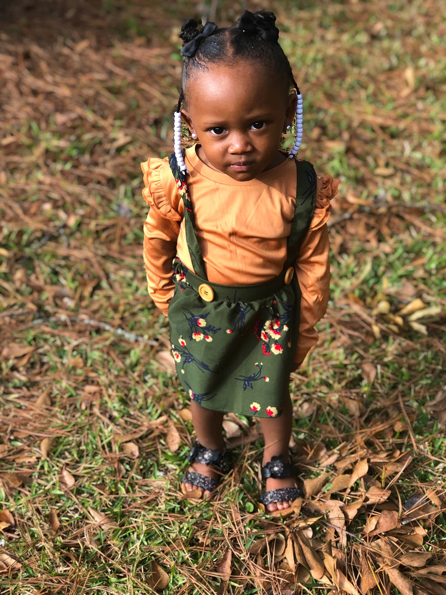 Nia is registered to the contest to win money with this photo: baby, baby_toddler_clothing, child, child_model, day_dress, nose, people_in_nature, person, sandal, slipper, toddler