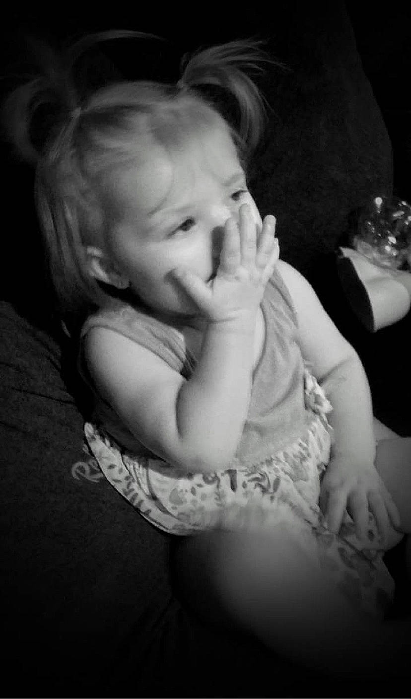 Raelynn is registered to the contest to win money with this photo: arm, baby, baby_toddler_clothing, black_and_white, cheek, comfort, event, flash_photography, fun, gesture, grass, happy, iris, lip, monochrome, monochrome_photography, nose, person, skin, style