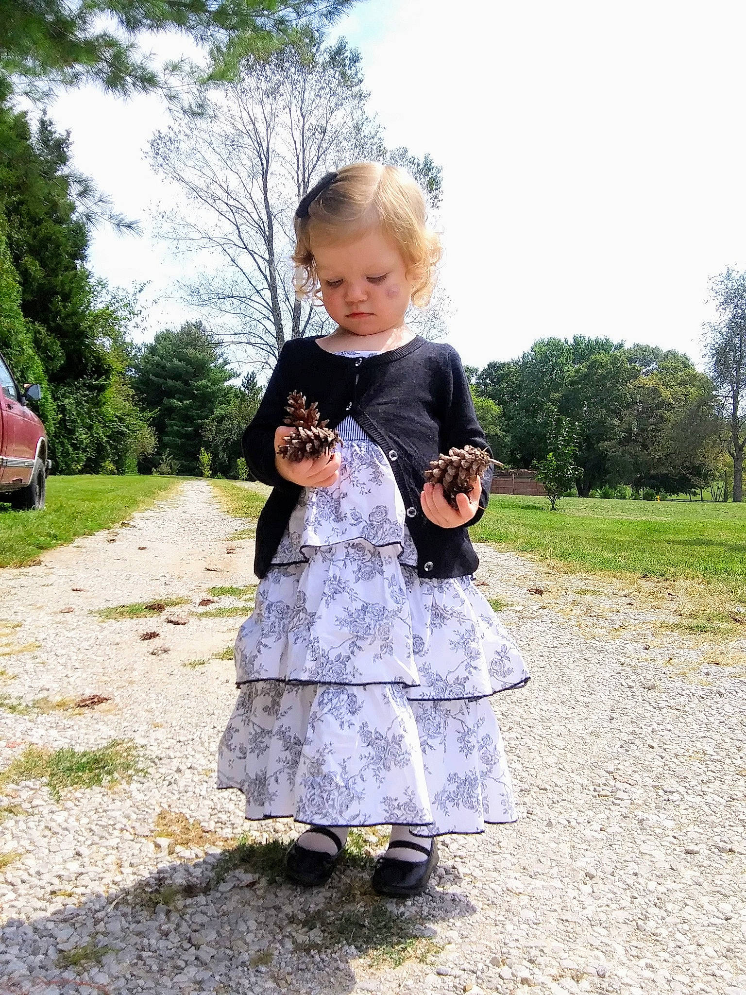 Britta joined the competition — help win amazing prizes! child, dress, grass, outerwear, person, photography, play, smile, summer, toddler, tree, vacation