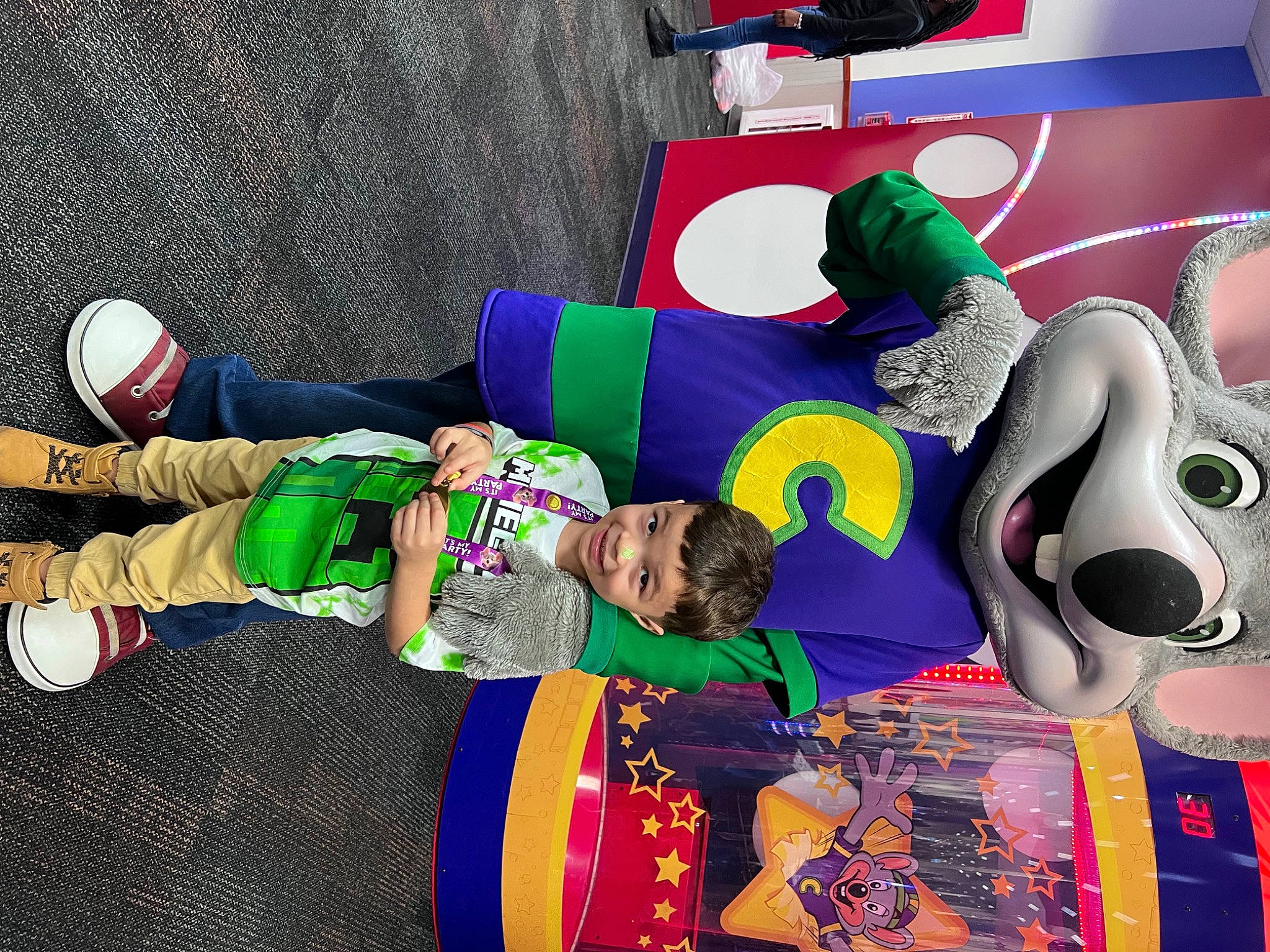 Elias is registered to the contest to win money with this photo: art, artist, baby, baby_toddler_clothing, event, fictional_character, fun, graphics, hat, illustration, joy, linens, pattern, person, play, product, room, sock, t_shirt, textile