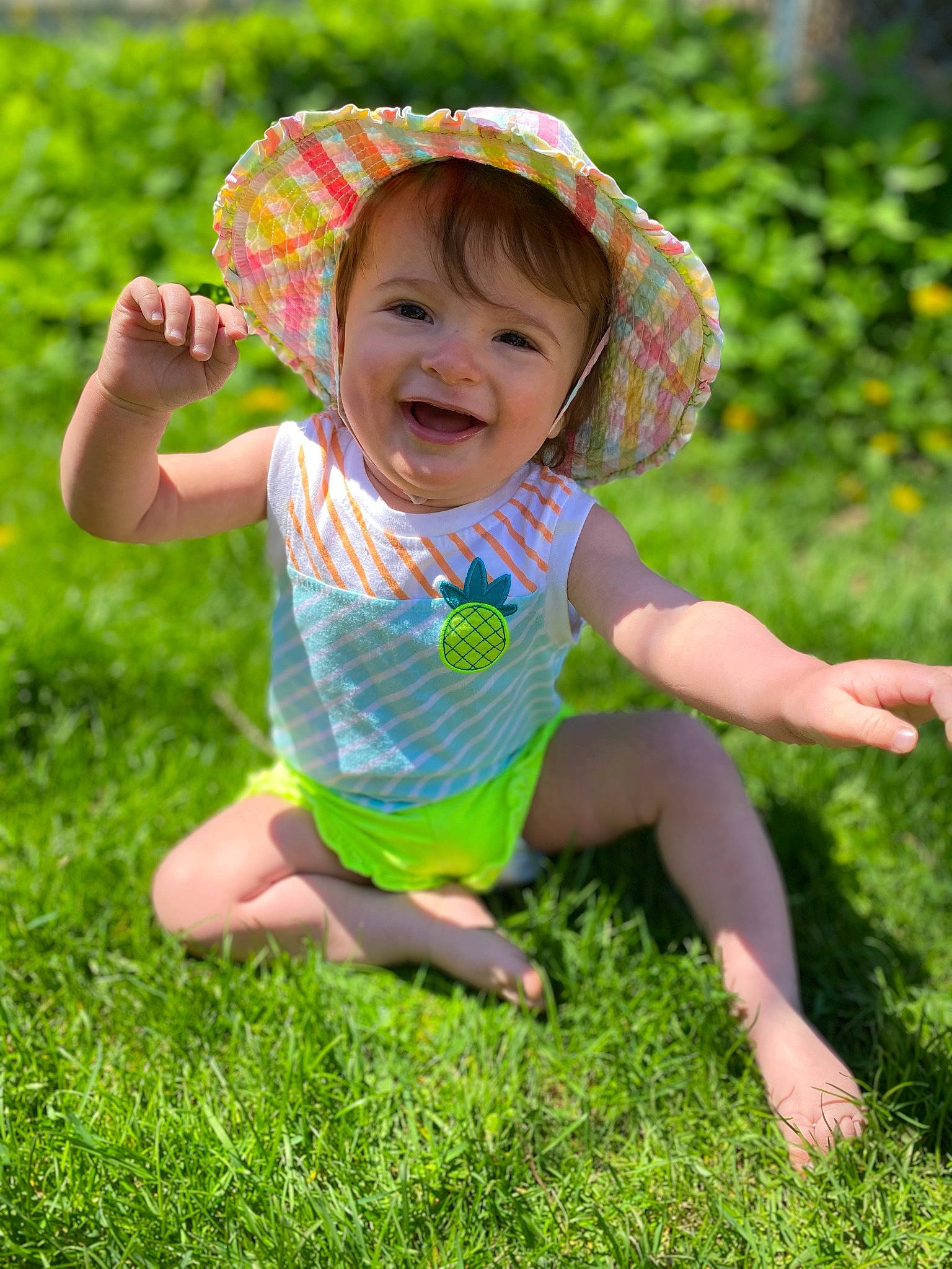 Phoebe joined the competition — help win amazing prizes! baby, baby_toddler_clothing, child, face, fun, grass, green, happy, joy, leaf, leisure, people_in_nature, person, pink, plant, recreation, skin, smile, summer, sun_hat