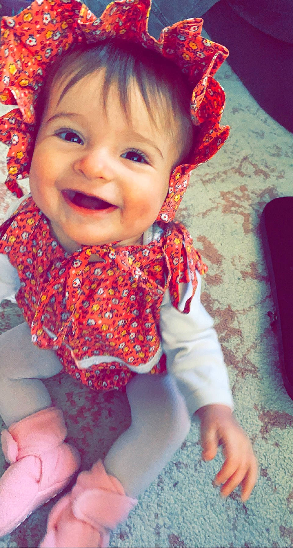 Phoebe is registered to the contest to win money with this photo: baby_toddler_clothing, cheek, chin, eye, face, happy, head, human_body, iris, joy, lip, mouth, neck, outerwear, person, photograph, pink, red, skin, sleeve