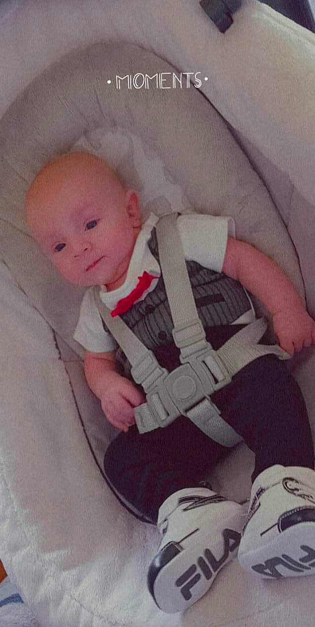 Damion joined the competition — help win amazing prizes! baby, baby_products, baby_toddler_clothing, cheek, child, comfort, eye, finger, hand, headgear, human_body, knee, lap, pattern, person, sleeve, sock, t_shirt, thigh, thumb