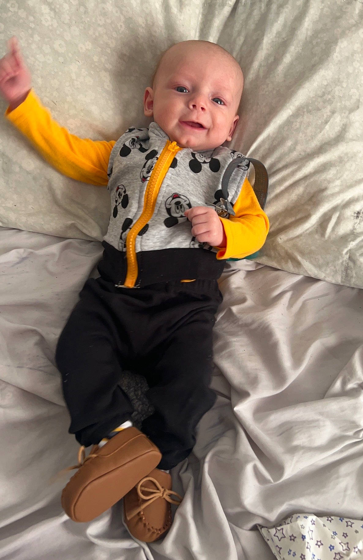 Ezekiel joined the competition — help win amazing prizes! baby, baby_products, baby_toddler_clothing, bedding, child, comfort, costume, formal_wear, fun, happy, linens, orange, person, personal_protective_equipment, room, sitting, sleeve, smile, sock, suit